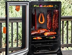 Image result for Vertical Smoker Full of Meat