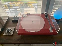 Image result for Exspensive Red and Gold Turntable