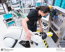 Image result for Person Building Robot