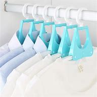 Image result for folding clothing hangers travel