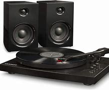 Image result for turntable with speaker