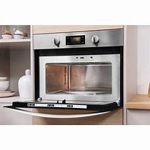 Image result for Indesit Integrated Microwave 900W