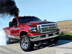 Image result for Big Diesel Trucks Rolling Coal