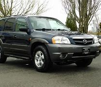 Image result for Mazda Tribute Tires 2003