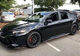 Image result for Toyota Camry Midnight Black with Red Interior