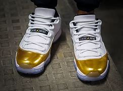 Image result for Jordan 11 Gold and White High