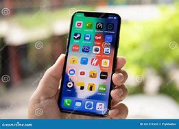 Image result for Local Hand Holding iPhone X