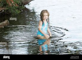 Image result for Little Girl Wading Lake