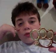 Image result for Paperweight Brass Knuckles