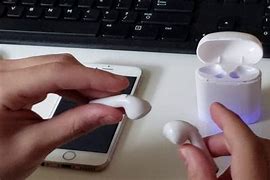 Image result for How to Put in Round Earbuds
