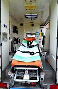 Image result for Green and Orange Ambulance Car