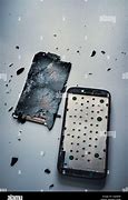 Image result for Smashed Pink Mobile Phones