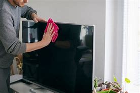 Image result for Dusting TV Screen