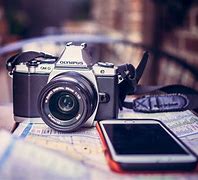 Image result for DSLR and Phone Pictures
