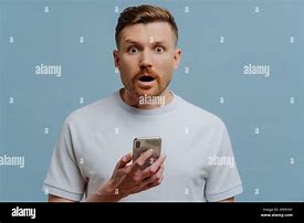 Image result for A Happy Surprised Man Using iPhone Alamy