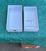 Image result for Empty iPhone Box with Rock