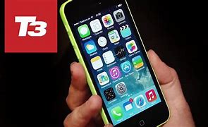 Image result for iPhone 5C in Hand