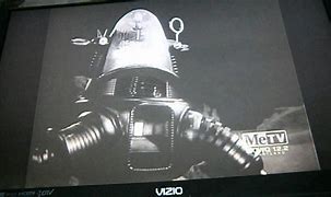 Image result for Lost in Space Robot Defending