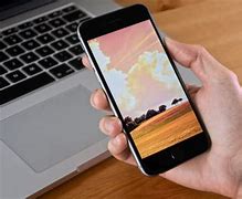 Image result for Iphon at Laptop