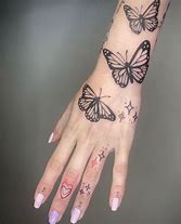 Image result for Butterfly Hand Tattoo