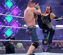 Image result for Rock John Cena Undertaker in WrestleMania