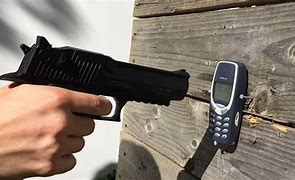 Image result for Nokia 3310 Weapon