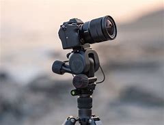 Image result for cameras tripods with remote