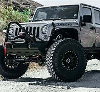 Image result for Lifted Jeep On Stock Wheels
