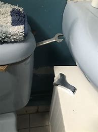 Image result for Broken Lever Inside Toilet Attached to the Chain