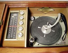 Image result for Solid State Magnavox Console