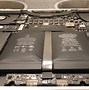 Image result for Very Puffed Up MacBook Battery