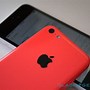 Image result for iPhone 5C with Case in Hand