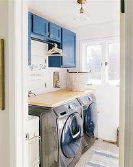 Image result for White Washer and Dryer with Blue Cabinets