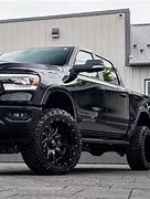 Image result for Black Ram 1500 Lifted