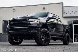 Image result for Blacked Out Dodge Ram 1500 Lifted