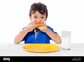 Image result for Picture of Breakfast Kid Eating Indian Boy