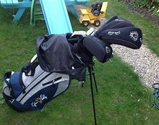 Image result for John Daly Golf Clubs