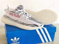 Image result for Yeezys Kids Size 4
