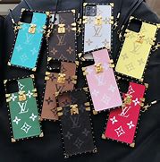 Image result for Louis Vuitton Black and Gold Trunk Phone Case