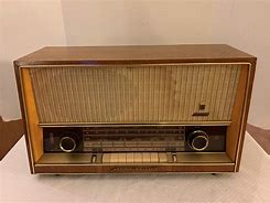 Image result for Vintage Portable Push Button Grundig Radio