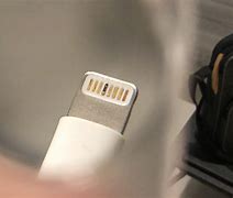 Image result for Yellow iPhone Charger Dirty