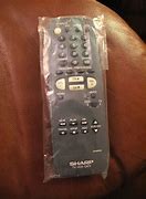 Image result for Sharp TV Screen and Remote