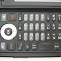 Image result for Small Clamshell Phone with Physical Keyboard