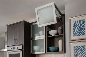 Image result for Vertical Folding Cabinet Doors