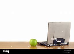 Image result for Apple On Top of Notebook