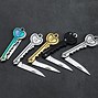 Image result for Spinning Knife Keychain