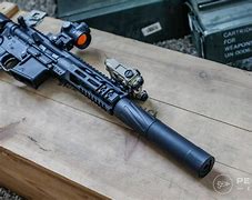 Image result for AR-15 with Suppressor