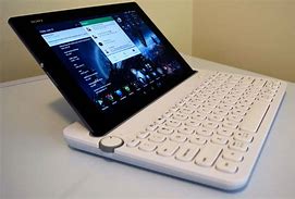 Image result for Keyboard with Smartphone Dock