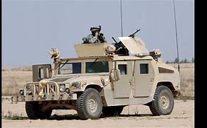 Image result for Humvee with 50 Cal