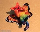Image result for Rainbow Unicorn Kitten with Butterfly Wings Flying